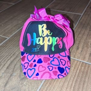 JoJo Siwa hat "be happy" with cute bow